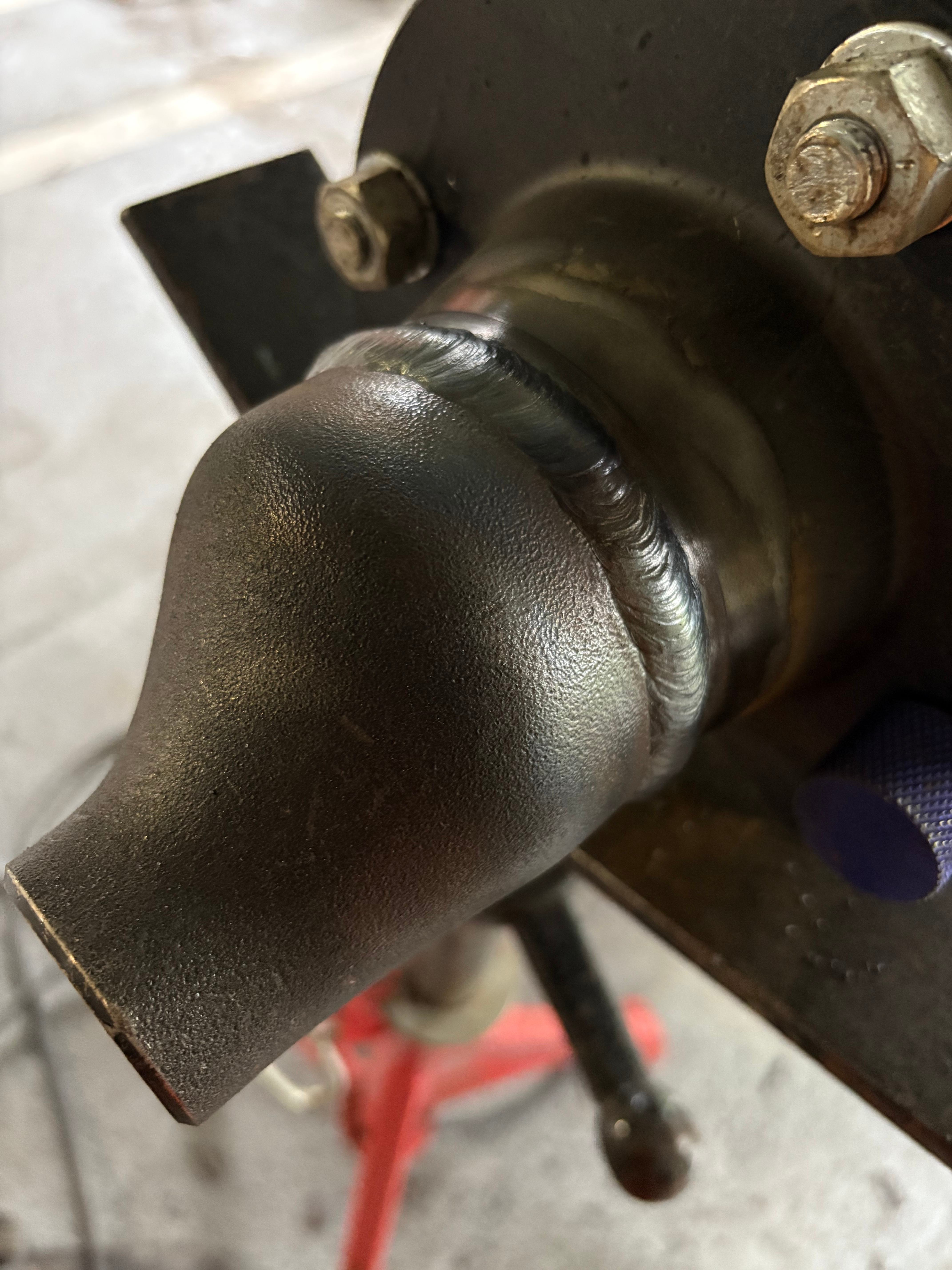 Close view of a finished weld on carbon steel